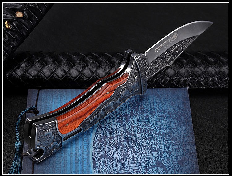 Vintage engraved pocket knife with wood inlay handle