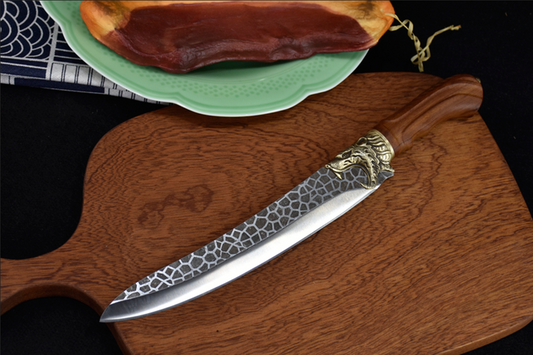Hand forged boning knife with rosewood handle