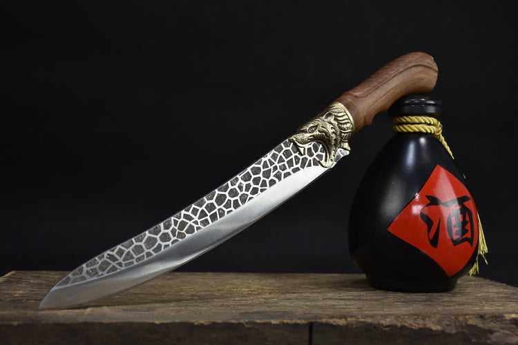 Hand forged boning knife with rosewood handle